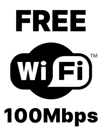 Black and white sign displaying "FREE WiFi 100Mbps" with the WiFi logo in the center.